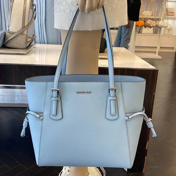 MICHAEL KORS Voyager Large Saffiano Leather EW Tote Shoulder Bag
LIGHT SKY
NWT - Picture 13 of 16
